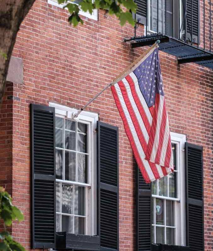 Mason restoring and building custom brick features in New England