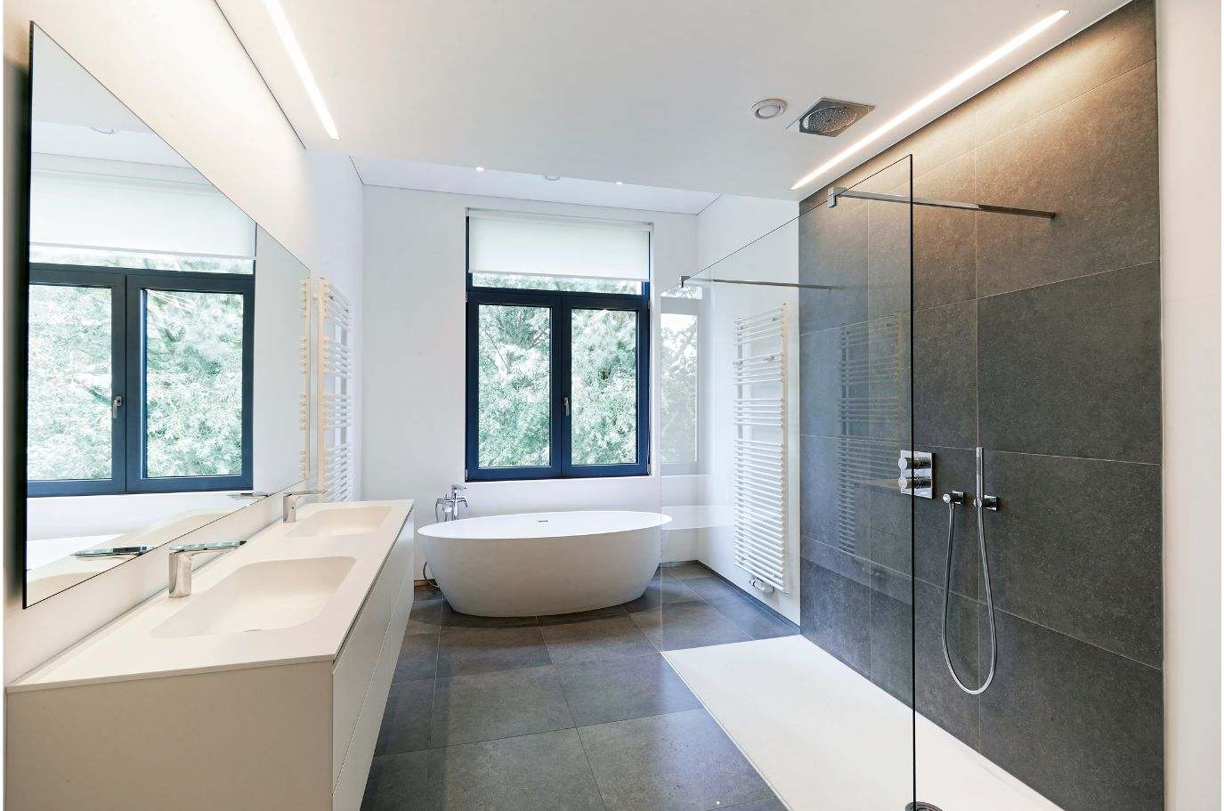 A serene, modern bathroom with custom tile work creating a spa-like retreat.