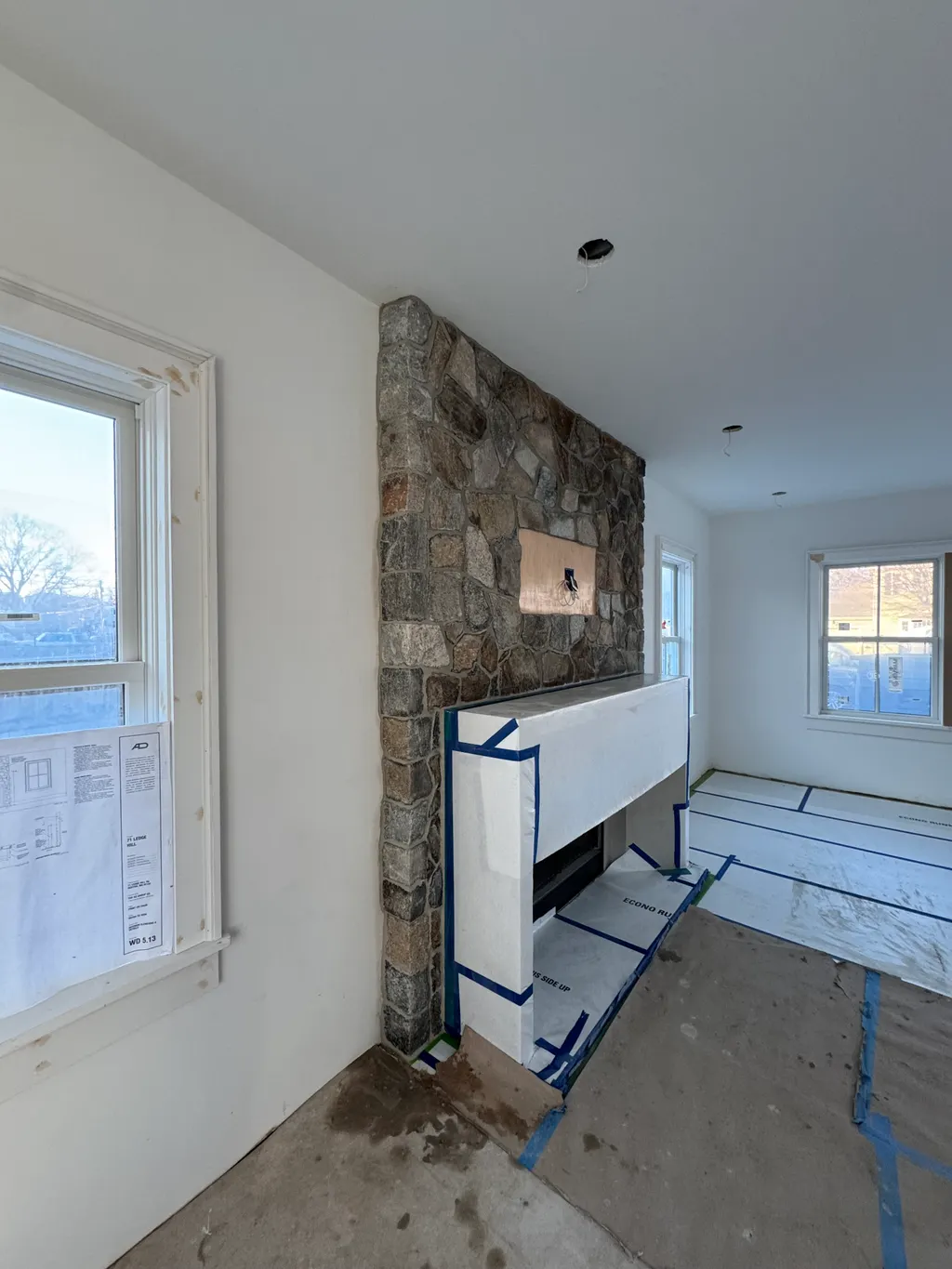 Custom stone fireplace installation